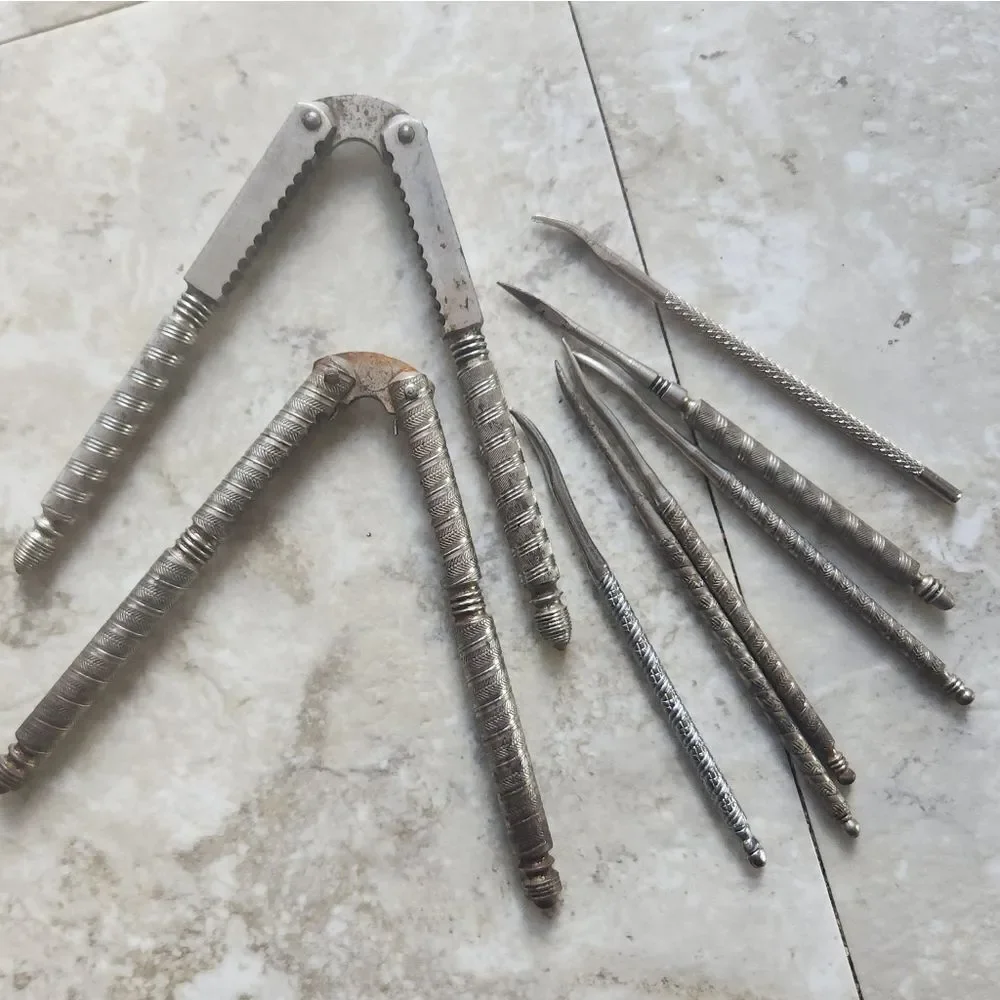 Silver metal Vintage Embossed Nutcracker & Six Picks set